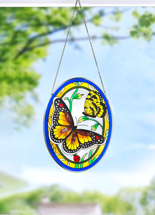 Glasplaat met metalen frame en metalen ketting