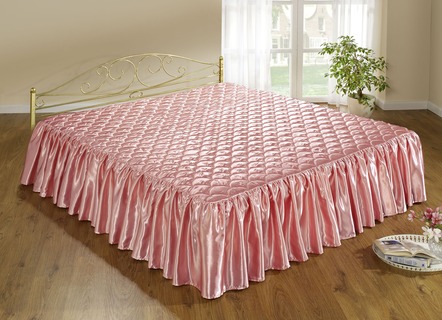 Elegante, glanzende sprei en kussenslopen met quilting in schelplook