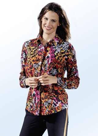 Aantrekkelijke blouse met lange manchetmouwen