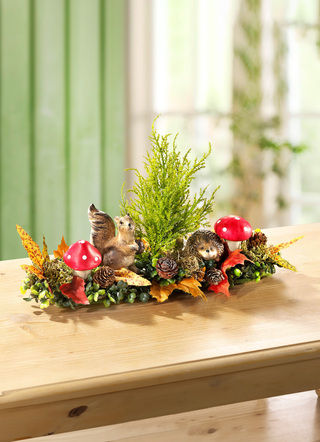 Tafelblad met herfstgrassen en bladeren