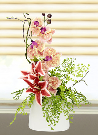Charmant orchideeënarrangement in een vaas