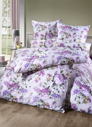 Beddengoedset met rozenmotieven