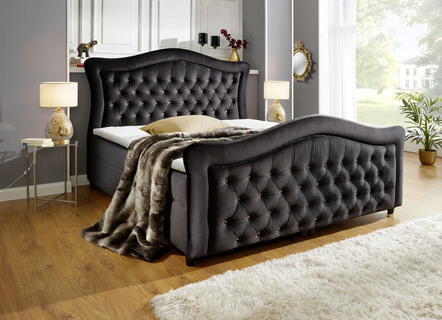 Boxspringbed met gevoerd hoofd- en voeteneind