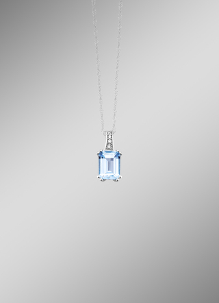 Hanger met diamanten en blauwe topaas