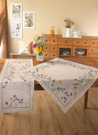 Prachtig geborduurde tafel- en kamerdecoratie