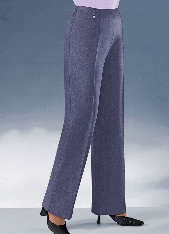 Broek met modieuze uitlopende pijpen 