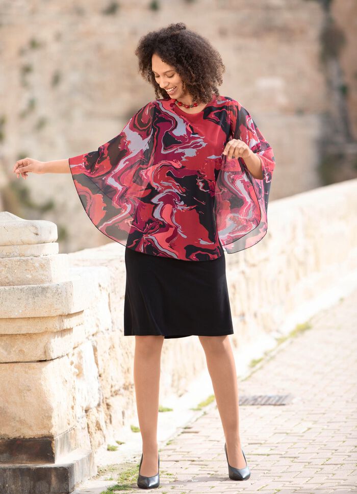 Kleed je in een trendy twee-in-&eacute;&eacute;n-look 