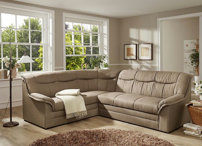 Gestoffeerd meubel op een stevig houten onderstel 