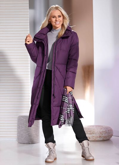 Functionele jas met opbergbare capuchon 