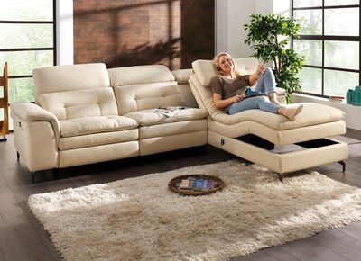 Gestoffeerde hoekbank met verstelbare hoofdsteun en ottomane 