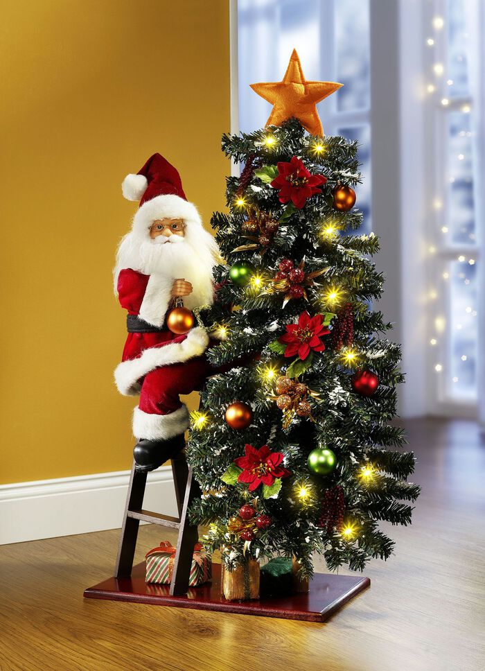 Kerstman versiert kerstboom 