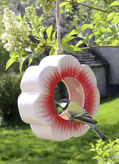 Klaprozenvoederstation van geglazuurd keramiek 