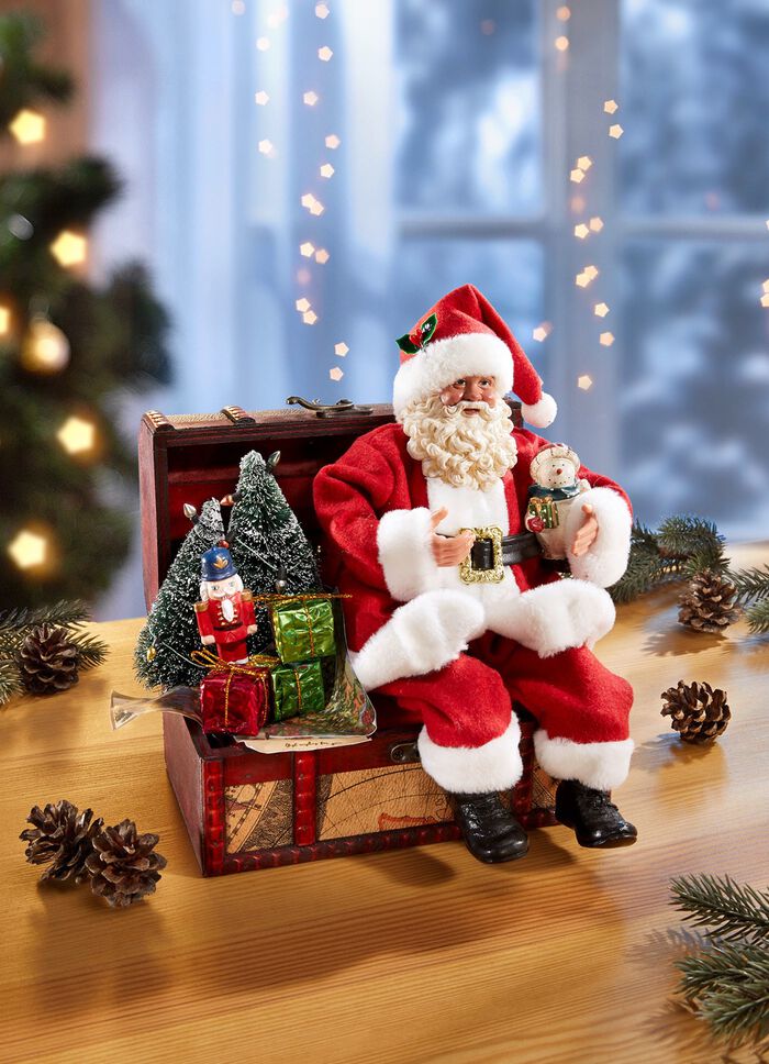 Kerstman op een kist 