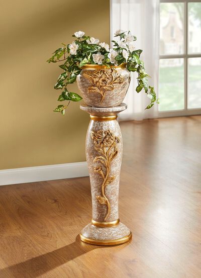 Handbeschilderde zuil met plantenbak 