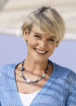 Ketting met diverse sieradenelementen 