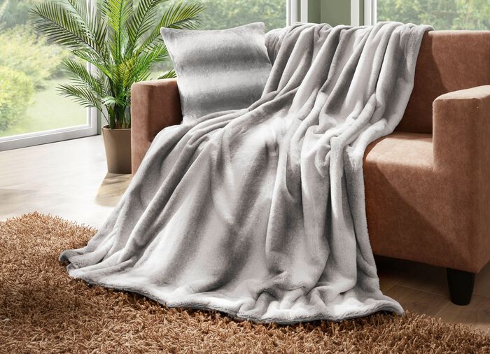 Deken en kussensloop van imitatie konijnenbont 