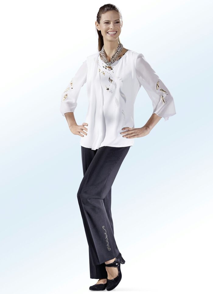 Broek met een opvallend siermotief met strasssteentjes 