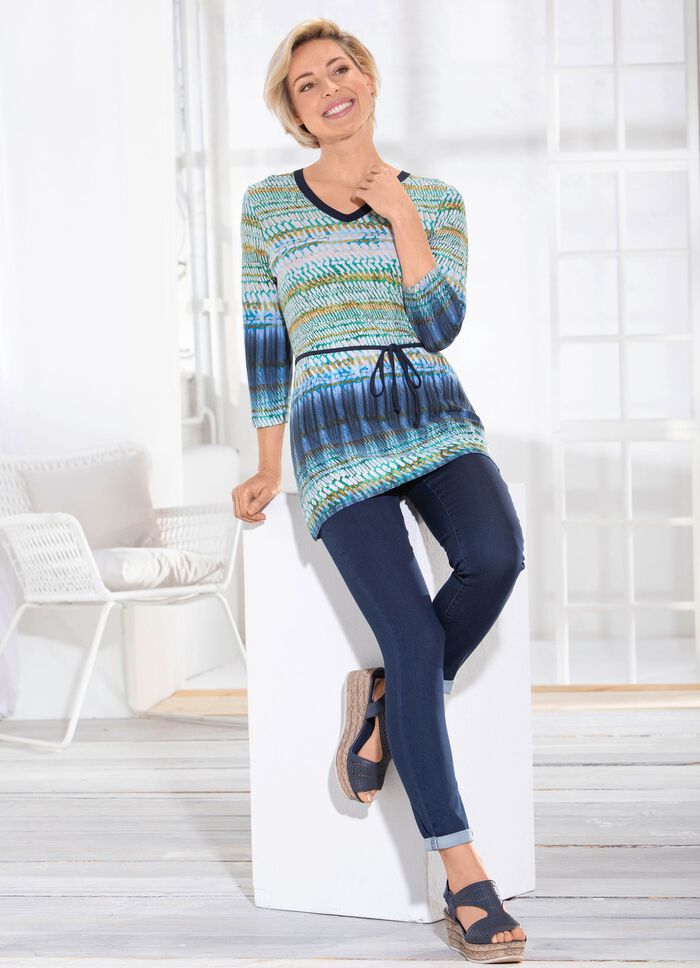 Prachtige tuniek met riemlussen en strikceintuur 