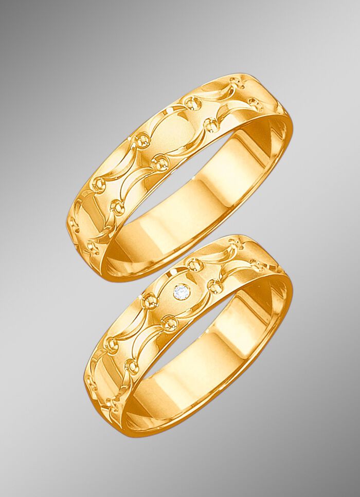 Trouwring met golfmotief 