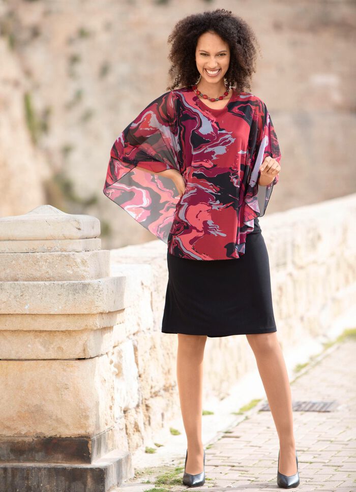 Kleed je in een trendy twee-in-&eacute;&eacute;n-look 