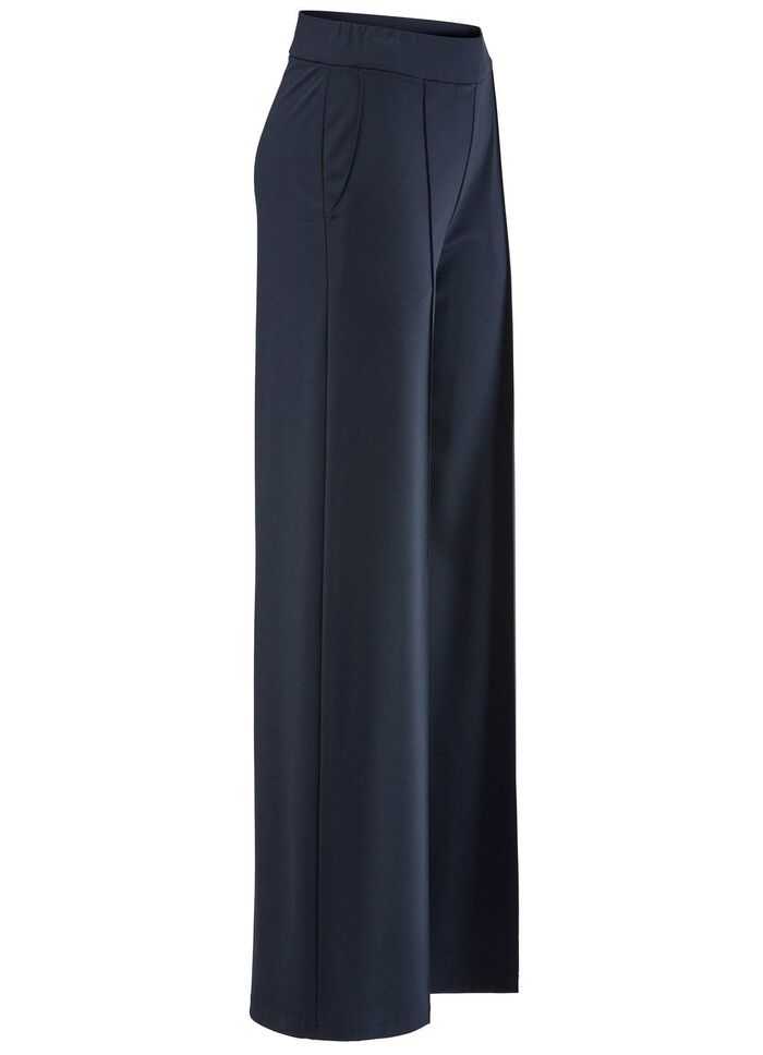 Broek met verlengende plooien 