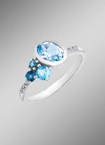 Damesring met blauwe topaas (behandeld) en synthetische zirkonia. 
