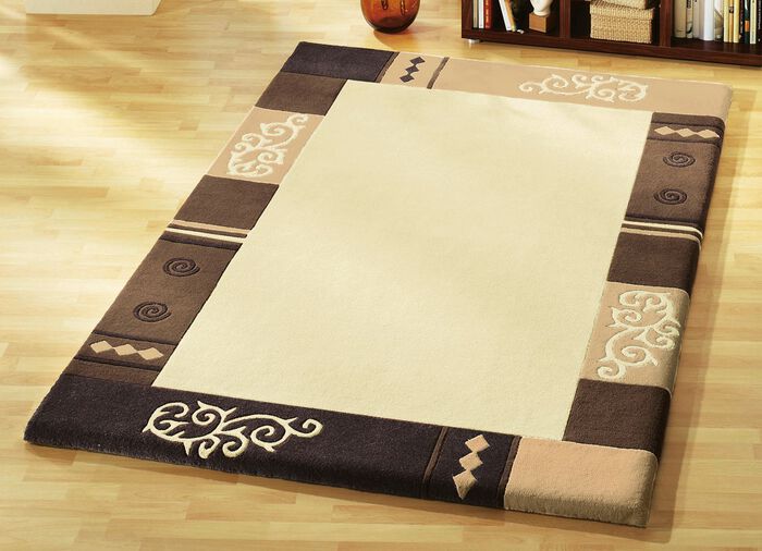 Handgetufte bruggen, vloerkleden en bedrokken 