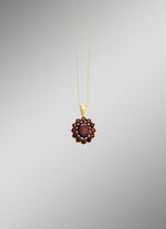 Bloemvormige hanger met granaat 