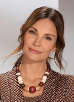 Halsketting met houten balletjes volgens cursus 