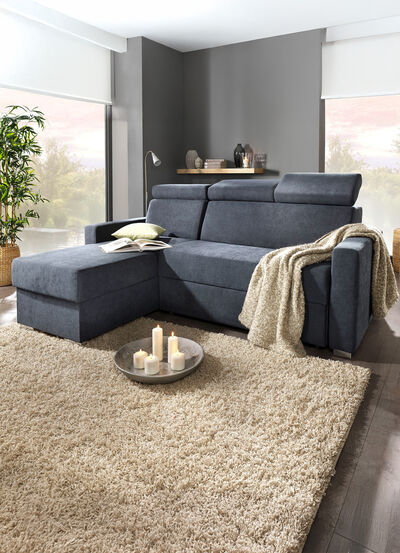 Gestoffeerd meubel met slaapfunctie en verstelbare hoofdsteunen 