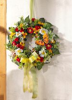 Wand- of deurdecoratie met voorjaarsbloemen 