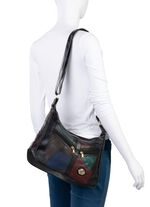 Patchworktas van nappaleer met synthetische inzetstukken 