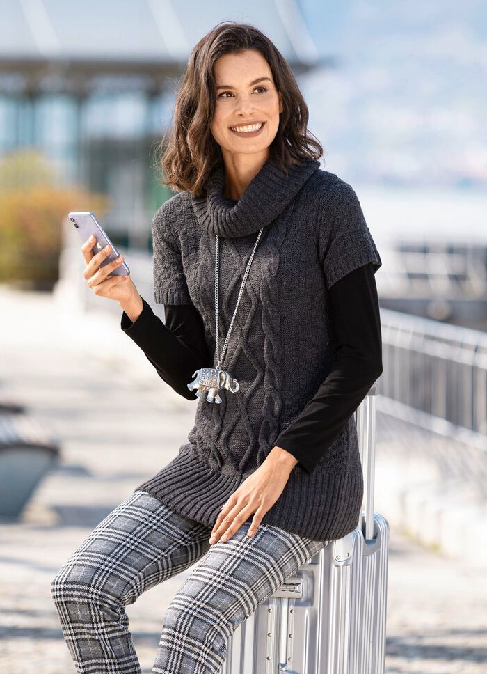 Lange trui met een structuurmix 