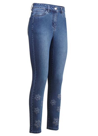 Jeans met geborduurde bloemetjes en strass-steentjes 