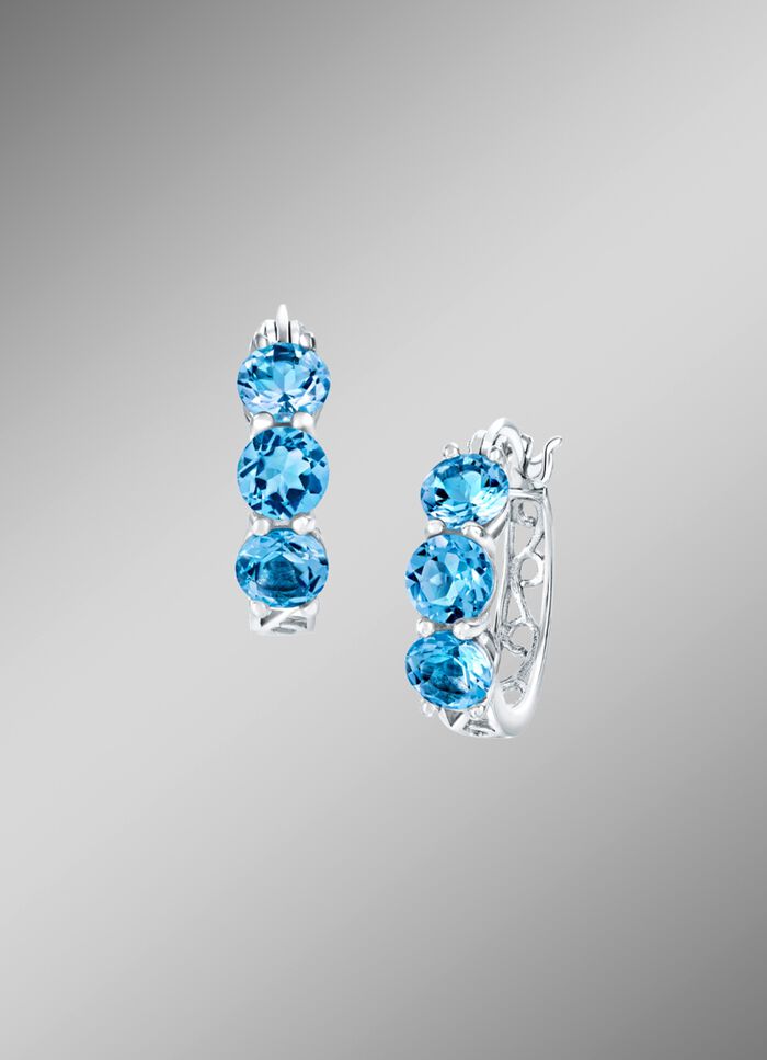 Versierde oorringen met blauwe topaas 