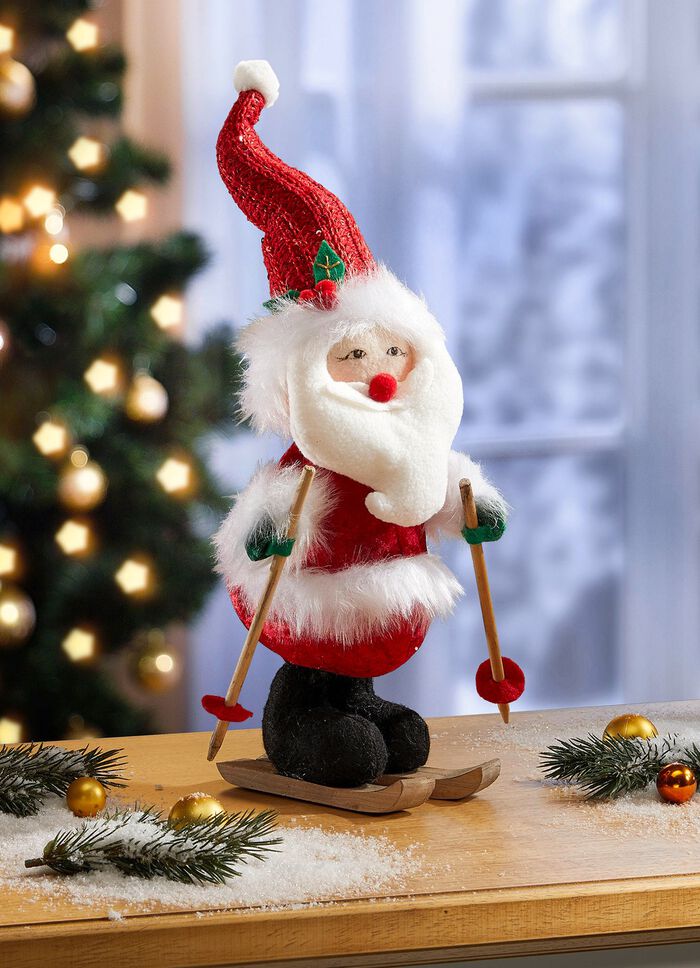 Kerstman op ski's 