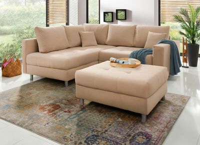 Gestoffeerd meubilair met kruk en kussens 