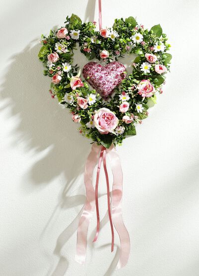Buxushart met roze roosjes 