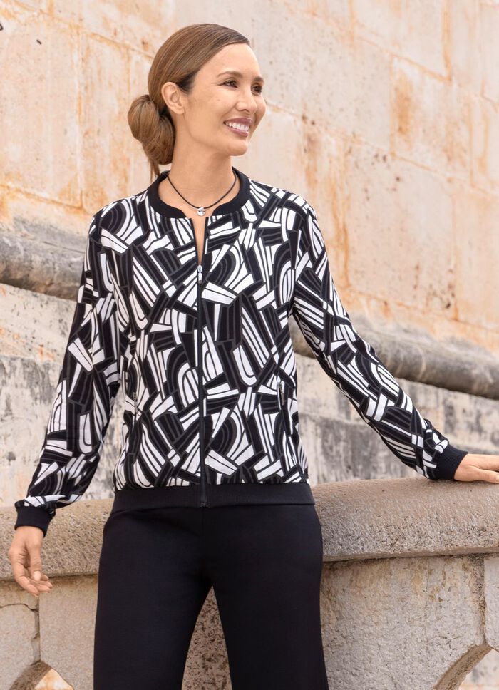 Blousejasje met zwarte geribbelde manchetten 