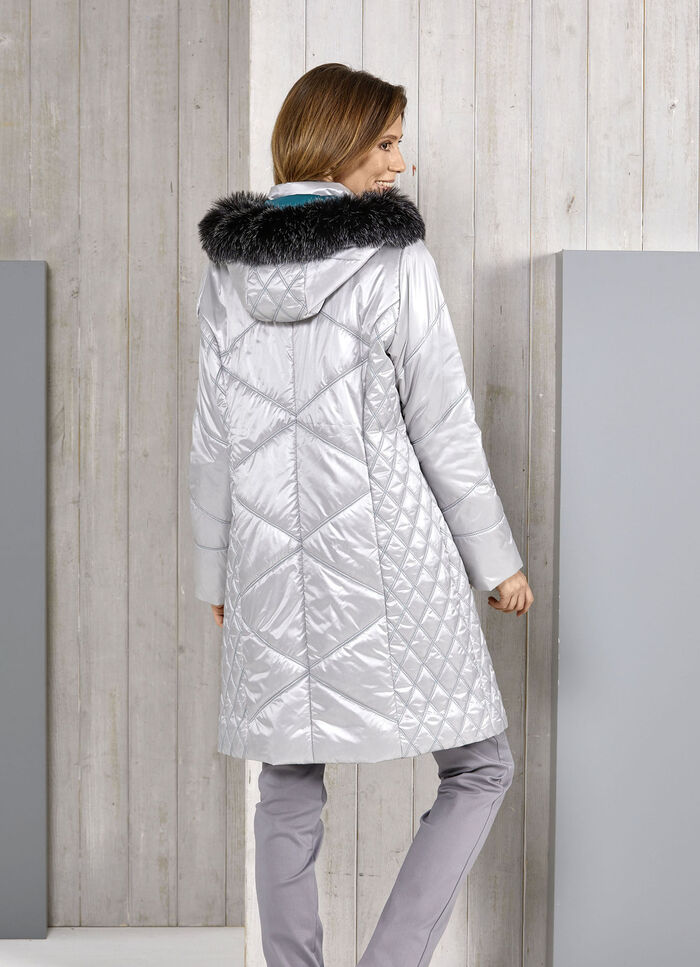Korte jas met smaragdgroene decoratieve quilting 