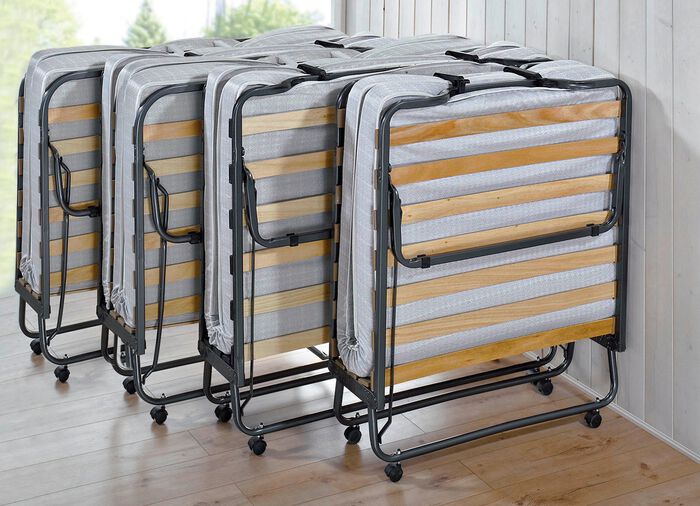 Logeerbed met metalen frame en automatische opstelling 