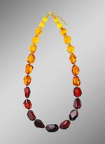 Elegante ketting met barnsteen en hematiet 