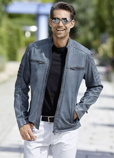 Kort leren jasje met sierstiksels 