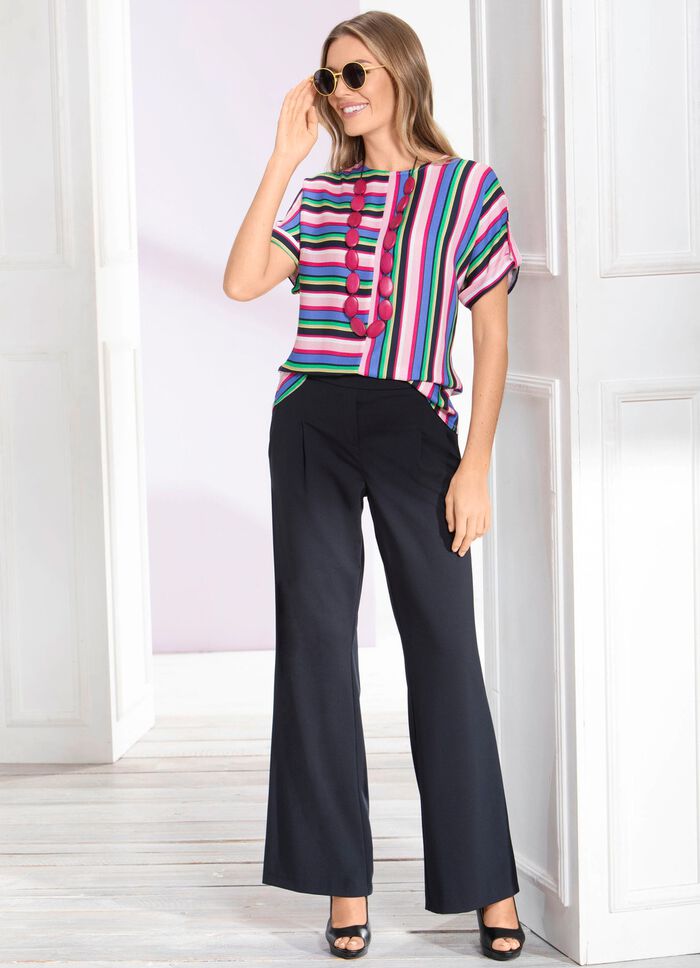 Broek met modieus uitlopende enkels 