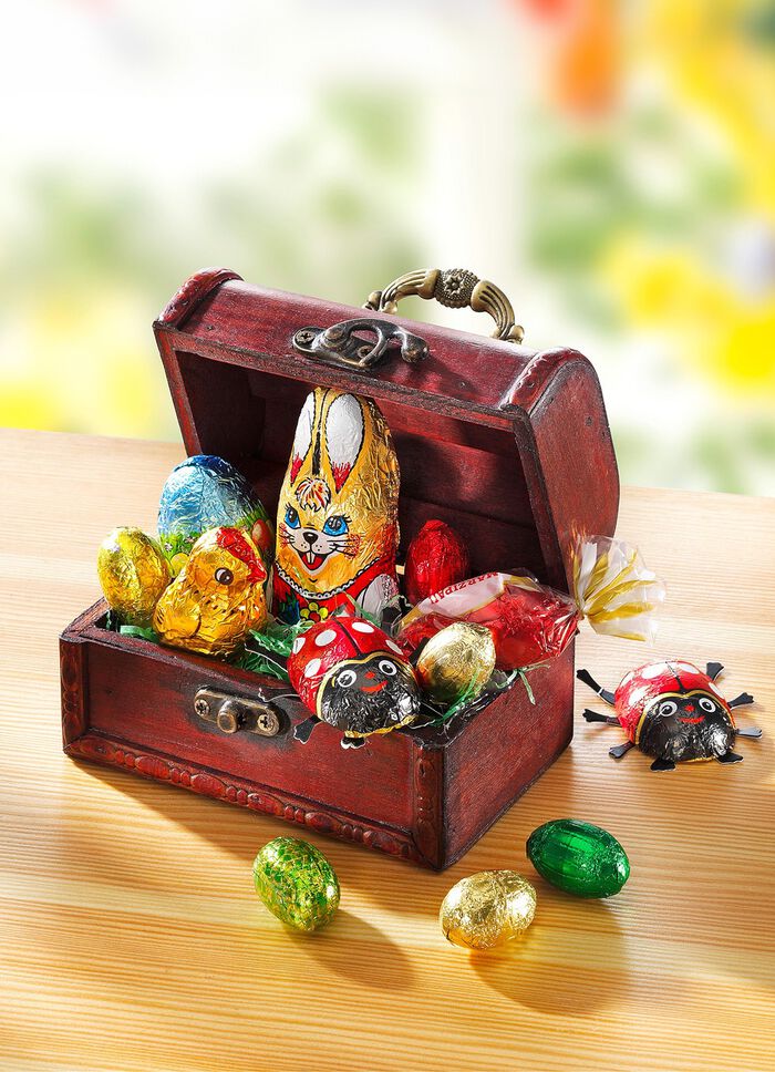 Zoet gevulde houten kist met handvat 