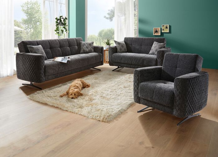 Gestoffeerd meubilair met bedfunctie en sierkussens 