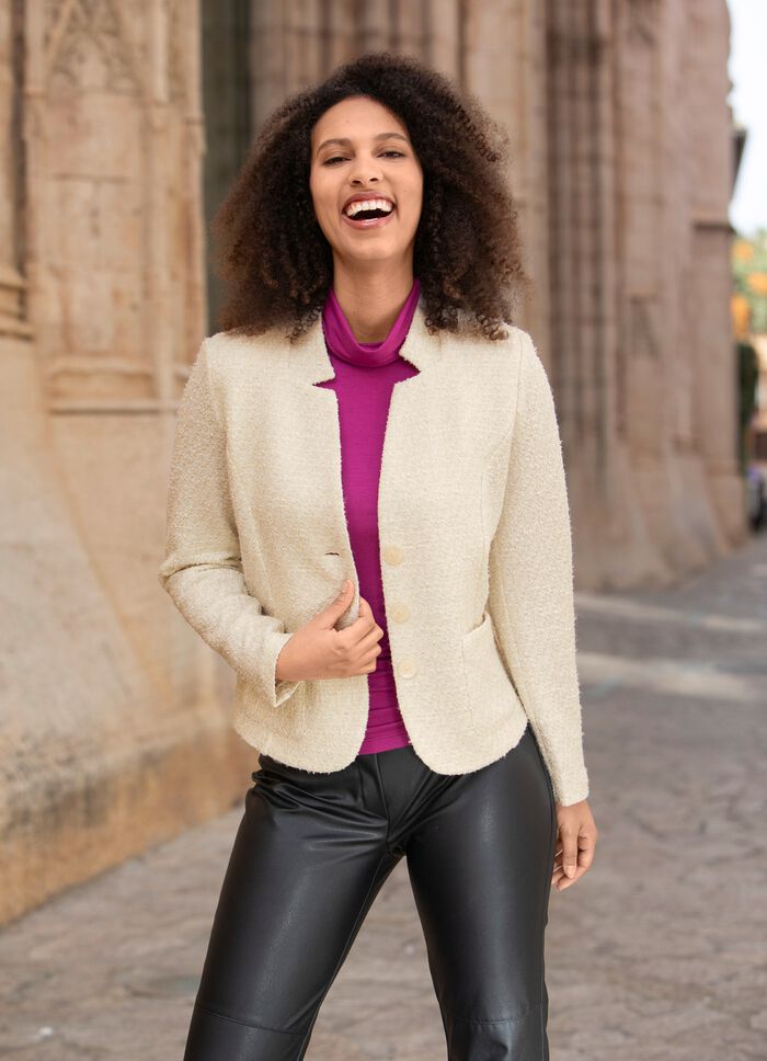 Blousejasje met schoudervullingen 