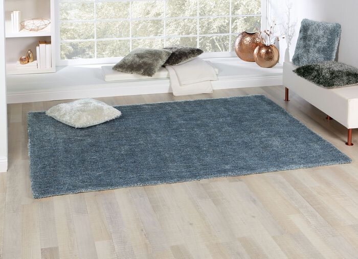 Shaggy vloerkleden en kussens met een katoenen achterkant 