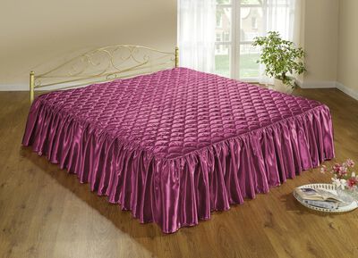 Elegante, glanzende sprei en kussenslopen met quilting in schelplook 