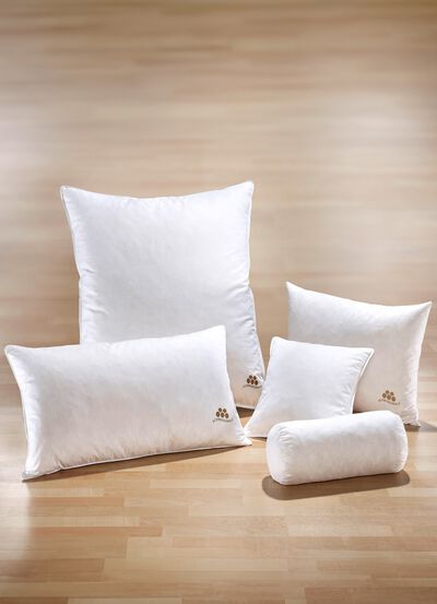 Kussenserie met goudkleurige satijnen bies 